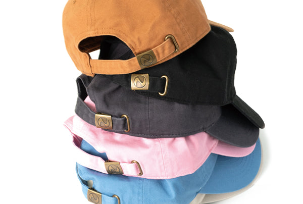 A standard baseball cap with an embroidered logo.